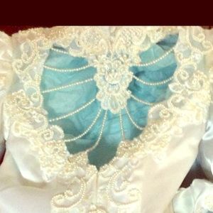 Wedding dress with long train that button up